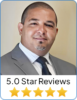 Attorney Gregory Chancy is in a suit with '5.0 Star Reviews' below the image - Cobb Personal Injury