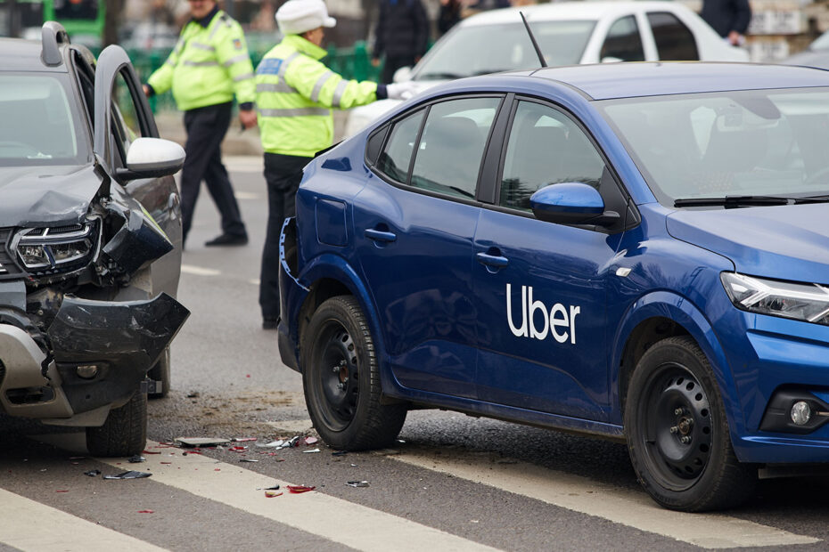 A blue car with visible damage after an accident, symbolizing "personal injury" - Cobb Personal Injury